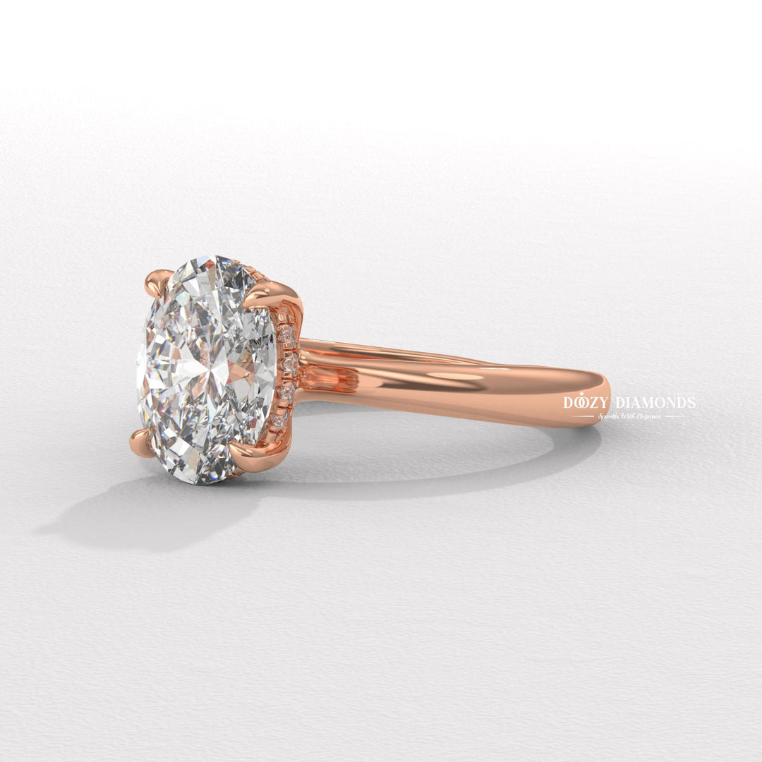 Oval solitaire lab grown diamond ring fitted on finger