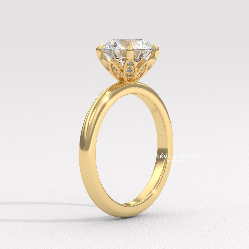 Side angle of round solitaire diamond engagement ring