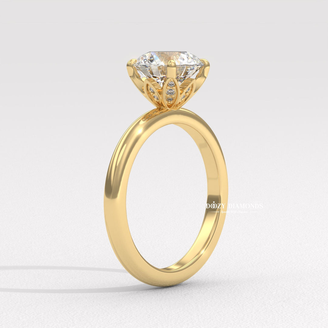 Side angle of round solitaire diamond engagement ring