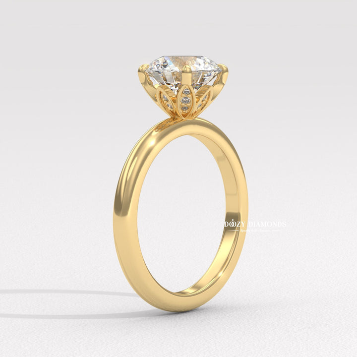 Side angle of round solitaire diamond engagement ring