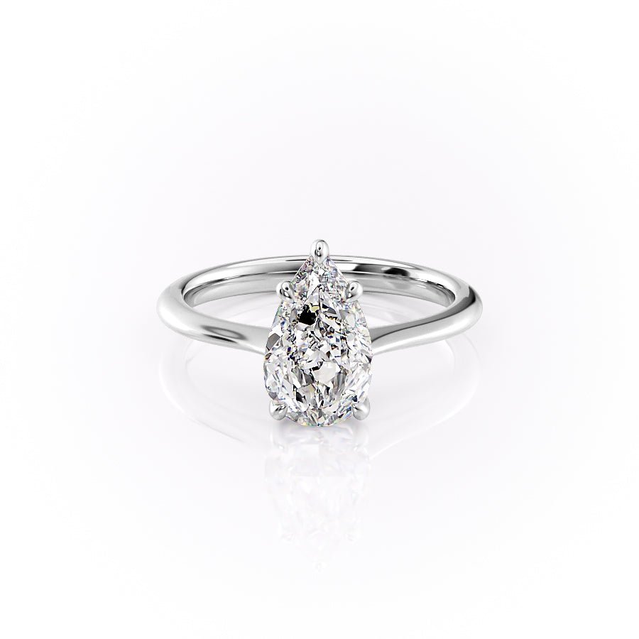 Macro shot of pear cut diamond facets in solitaire ring setting