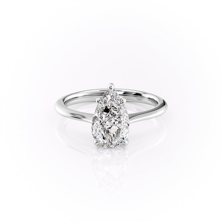 Macro shot of pear cut diamond facets in solitaire ring setting