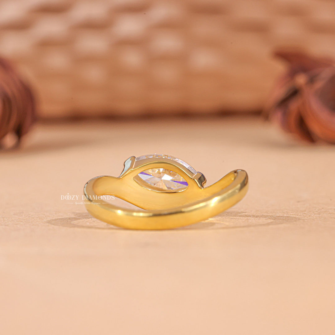 Marquise solitaire diamond ring presented in signature gift packaging