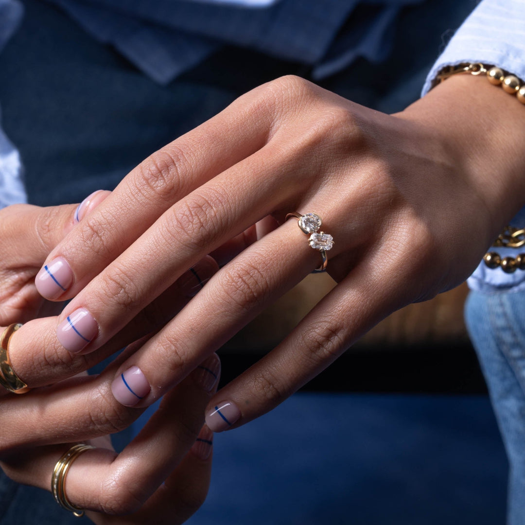 Oval solitaire engagement ring viewed from the side