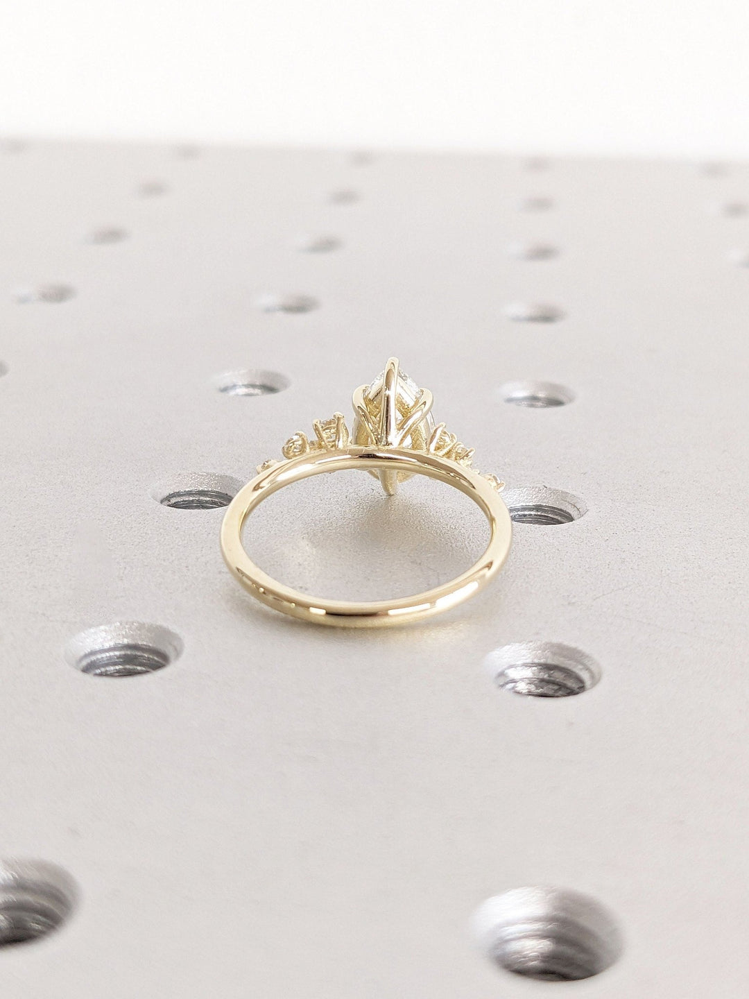 Handcrafted pear cut cluster lab grown diamond engagement ring