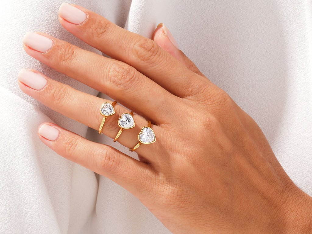 Top-down view of heart cut bezel engagement ring