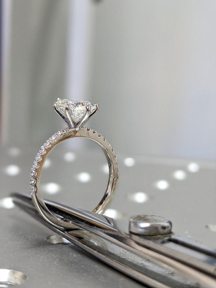 Pear cut diamond ring worn on hand