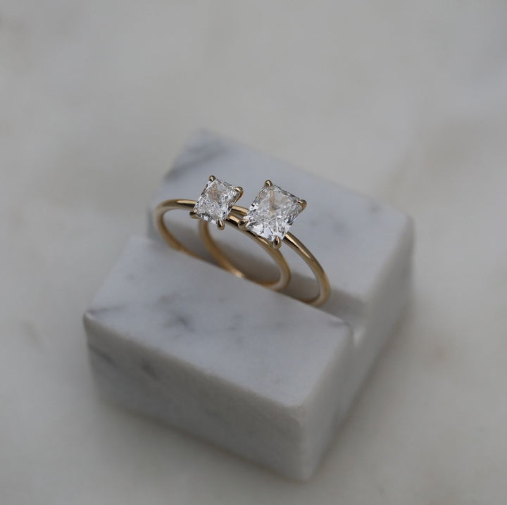 Radiant solitaire engagement ring viewed from the side