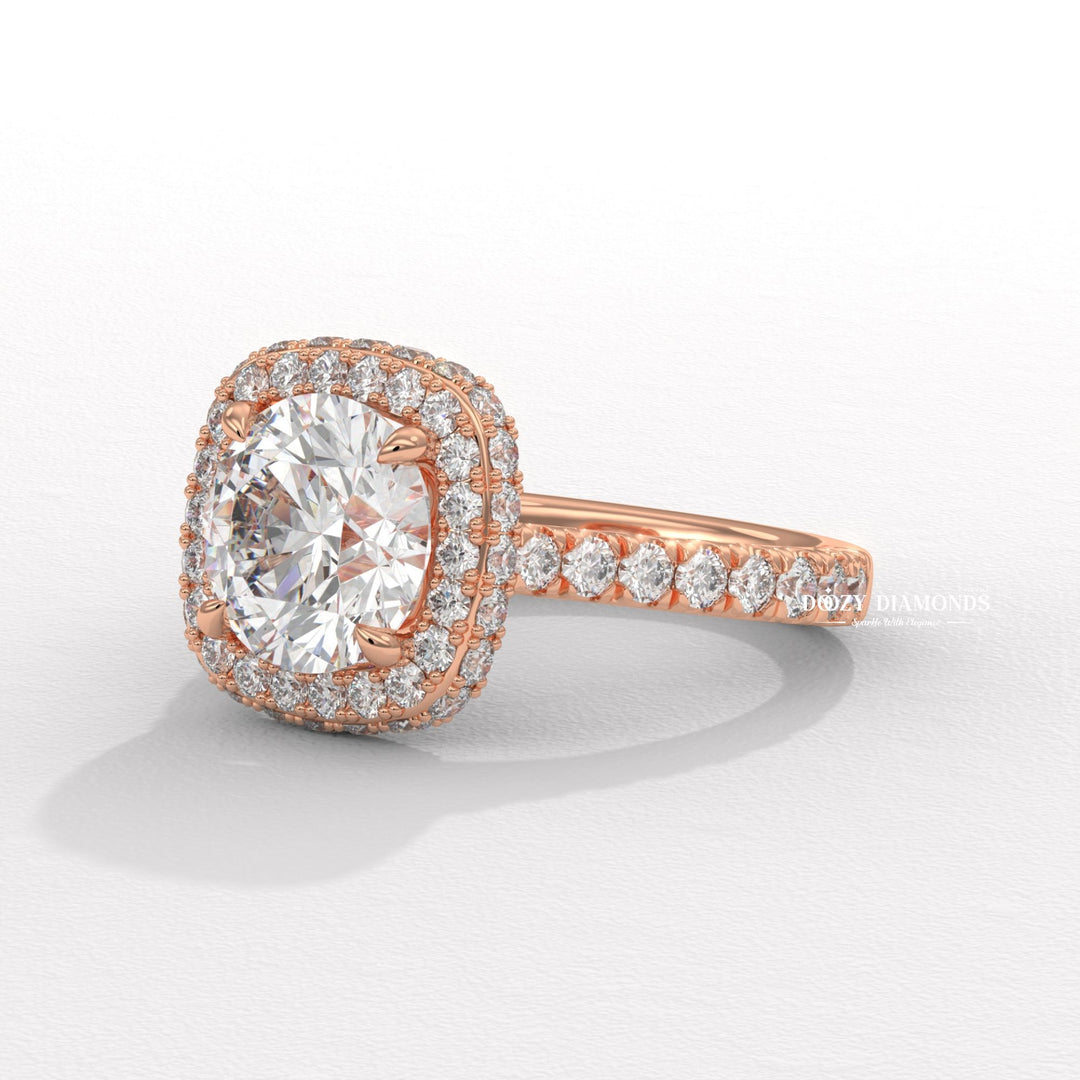 Round cut halo engagement ring shown in real-life wear