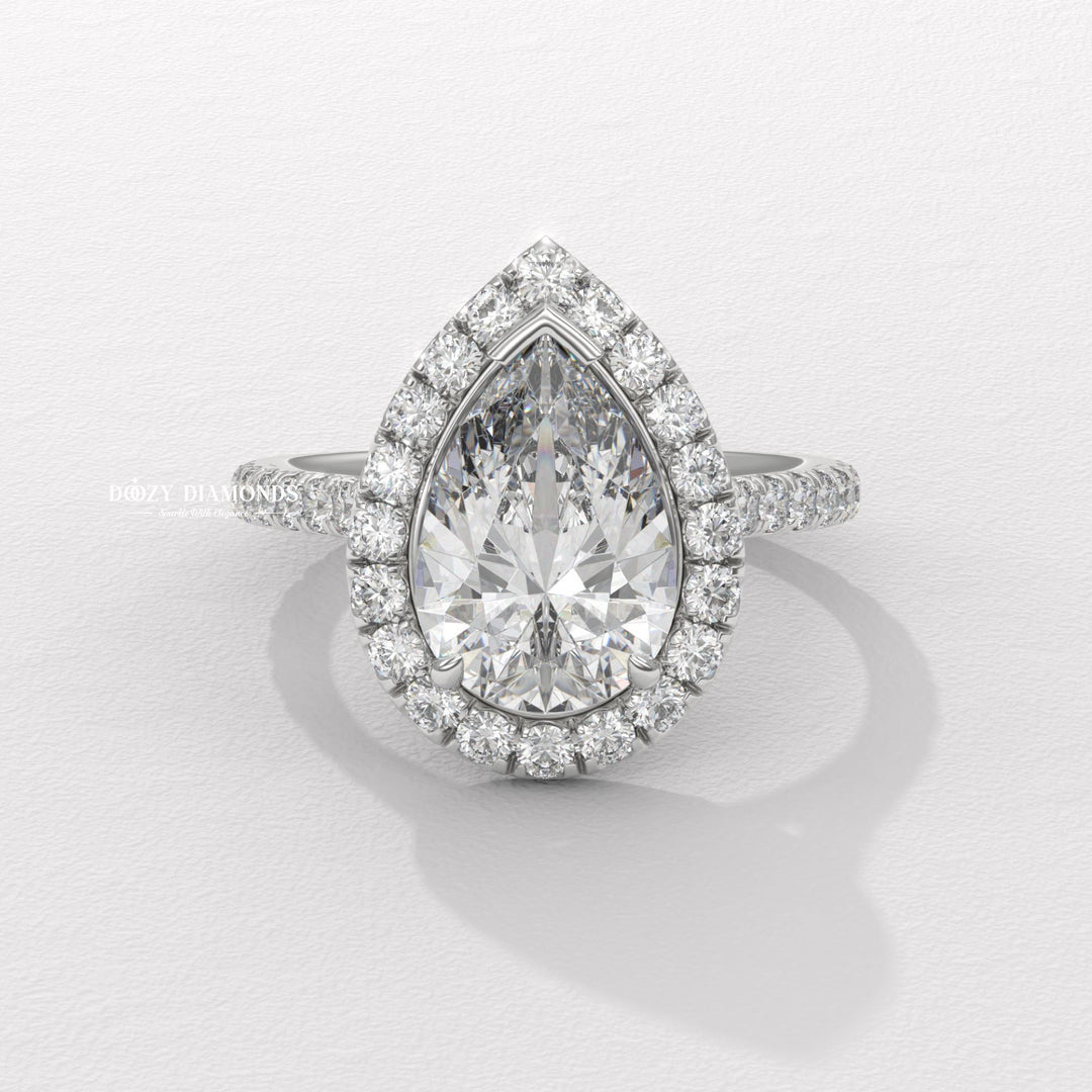 Pear cut engagement ring side view showing band detail