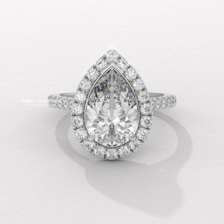 Pear cut engagement ring side view showing band detail