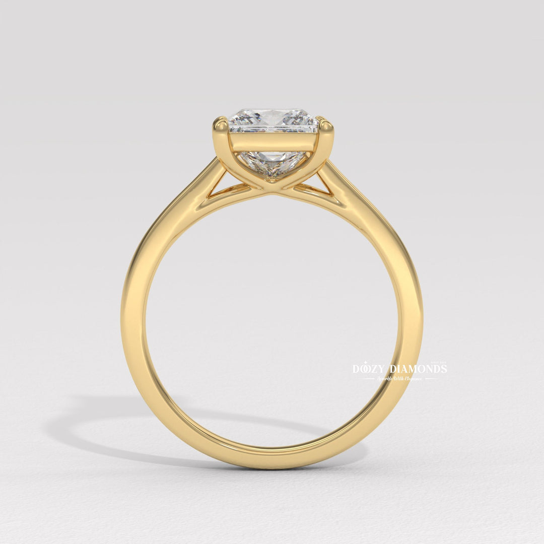 Princess solitaire diamond ring presented in signature gift packaging