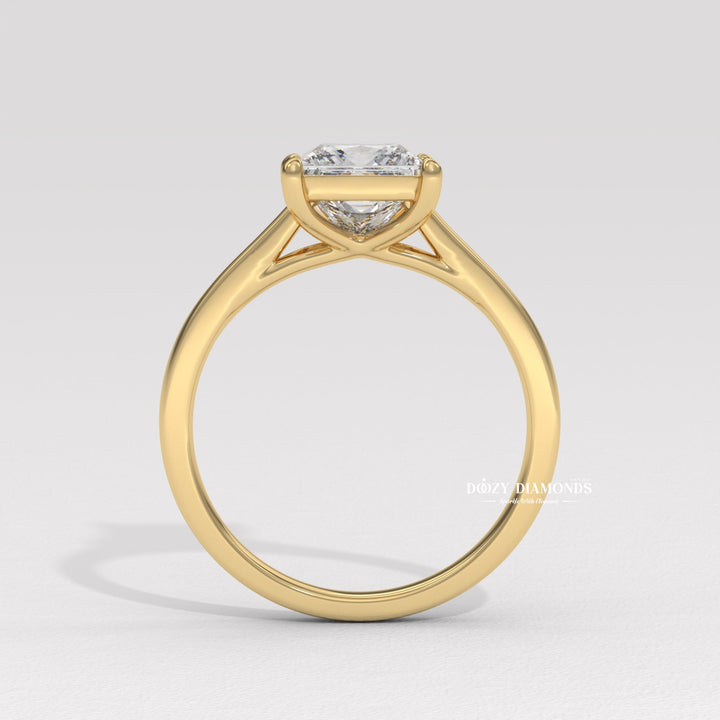 Princess solitaire diamond ring presented in signature gift packaging