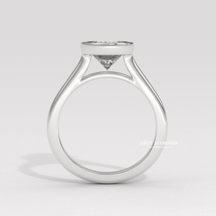 Oval cut engagement ring side view showing band detail