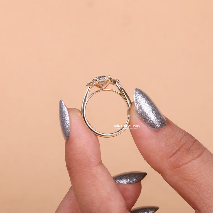 Oval cluster lab grown diamond ring fitted on finger