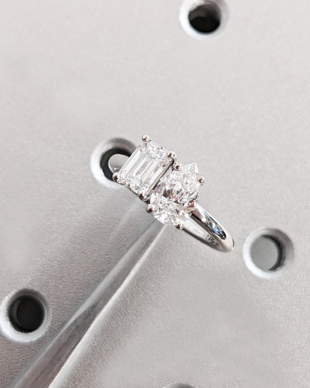 Detailed close-up of pear solitaire diamond engagement ring