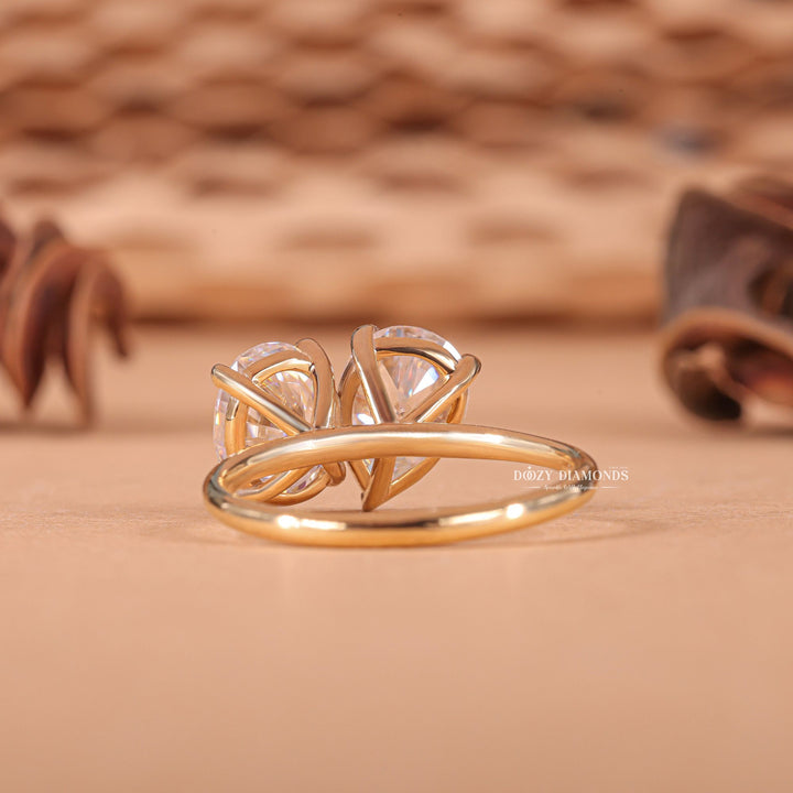 Oval solitaire engagement ring photographed in natural light