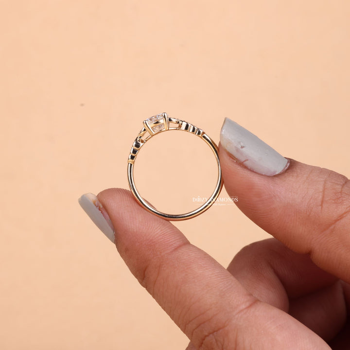 Round pave lab grown diamond ring fitted on finger