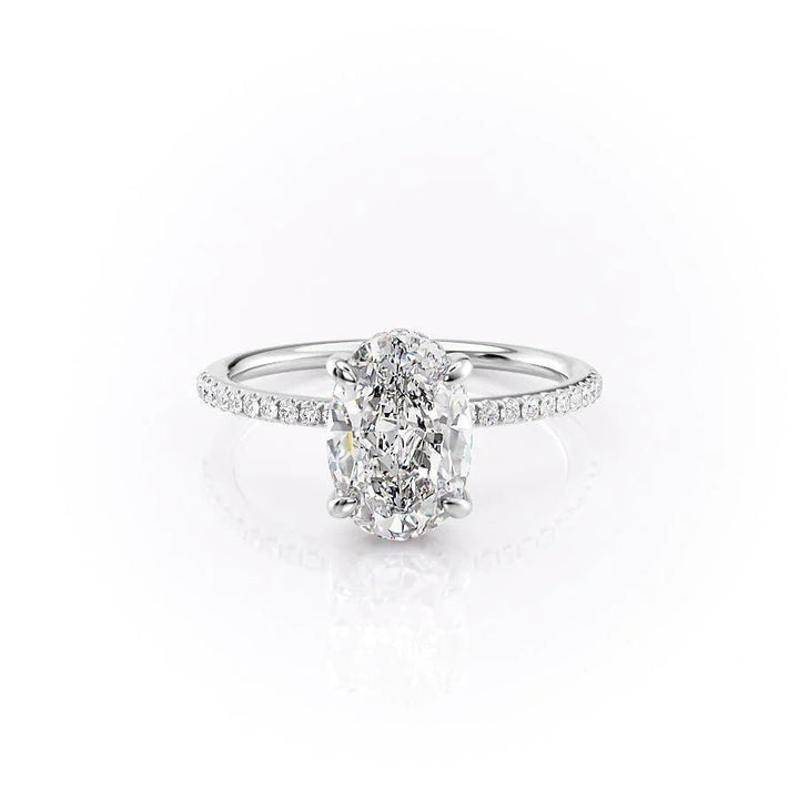 Macro shot of oval cut diamond facets in hidden halo ring setting
