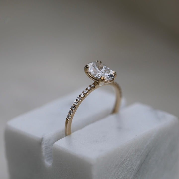 Side angle of oval solitaire diamond engagement ring