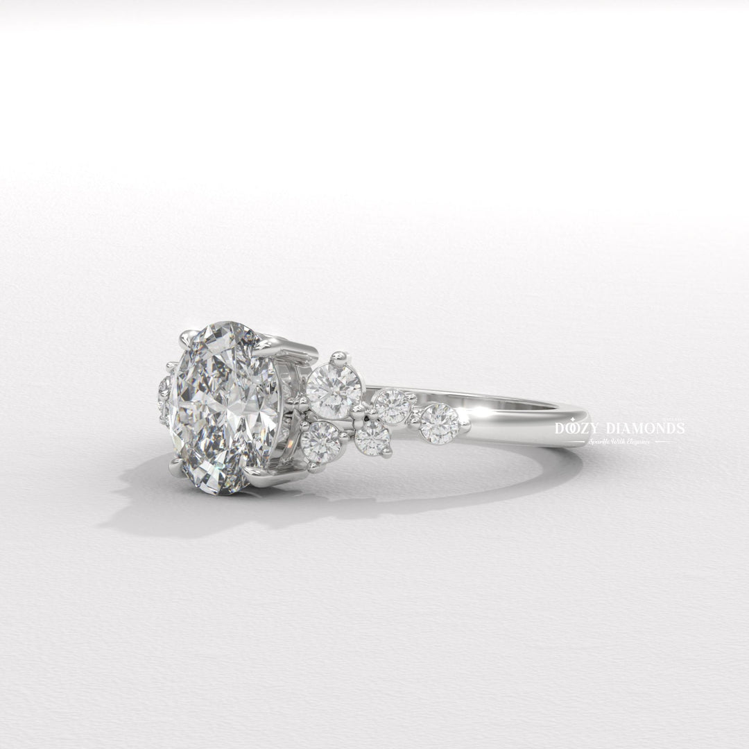 Unboxing view of oval cut cluster diamond engagement ring