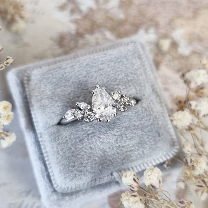 Handcrafted pear cut cluster lab grown diamond engagement ring