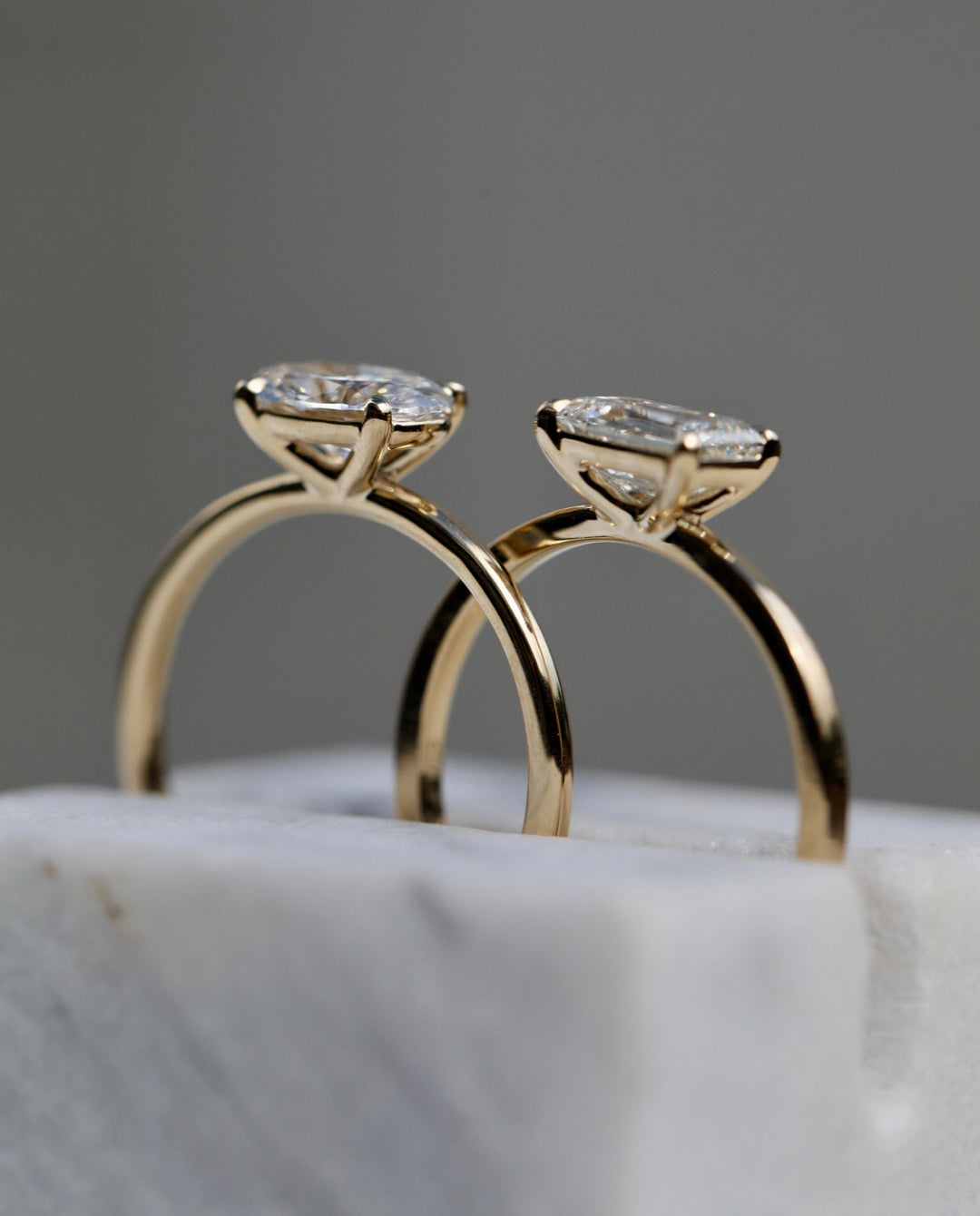 Detailed close-up of oval solitaire diamond engagement ring