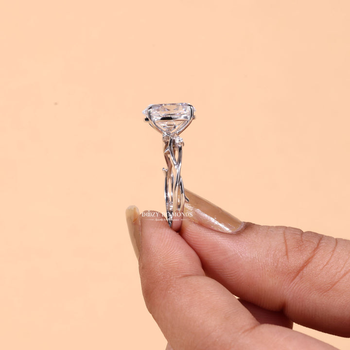 Oval solitaire lab grown diamond ring side profile in gold setting