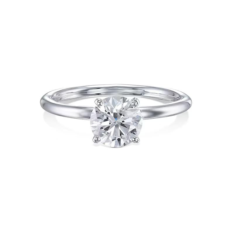 Round solitaire engagement ring with IGI certificate and packaging