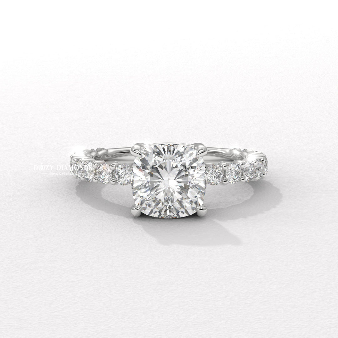 Cushion solitaire diamond ring presented in signature gift packaging