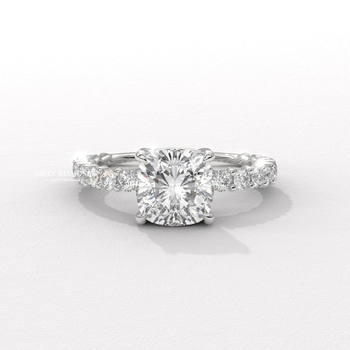 Cushion solitaire diamond ring presented in signature gift packaging