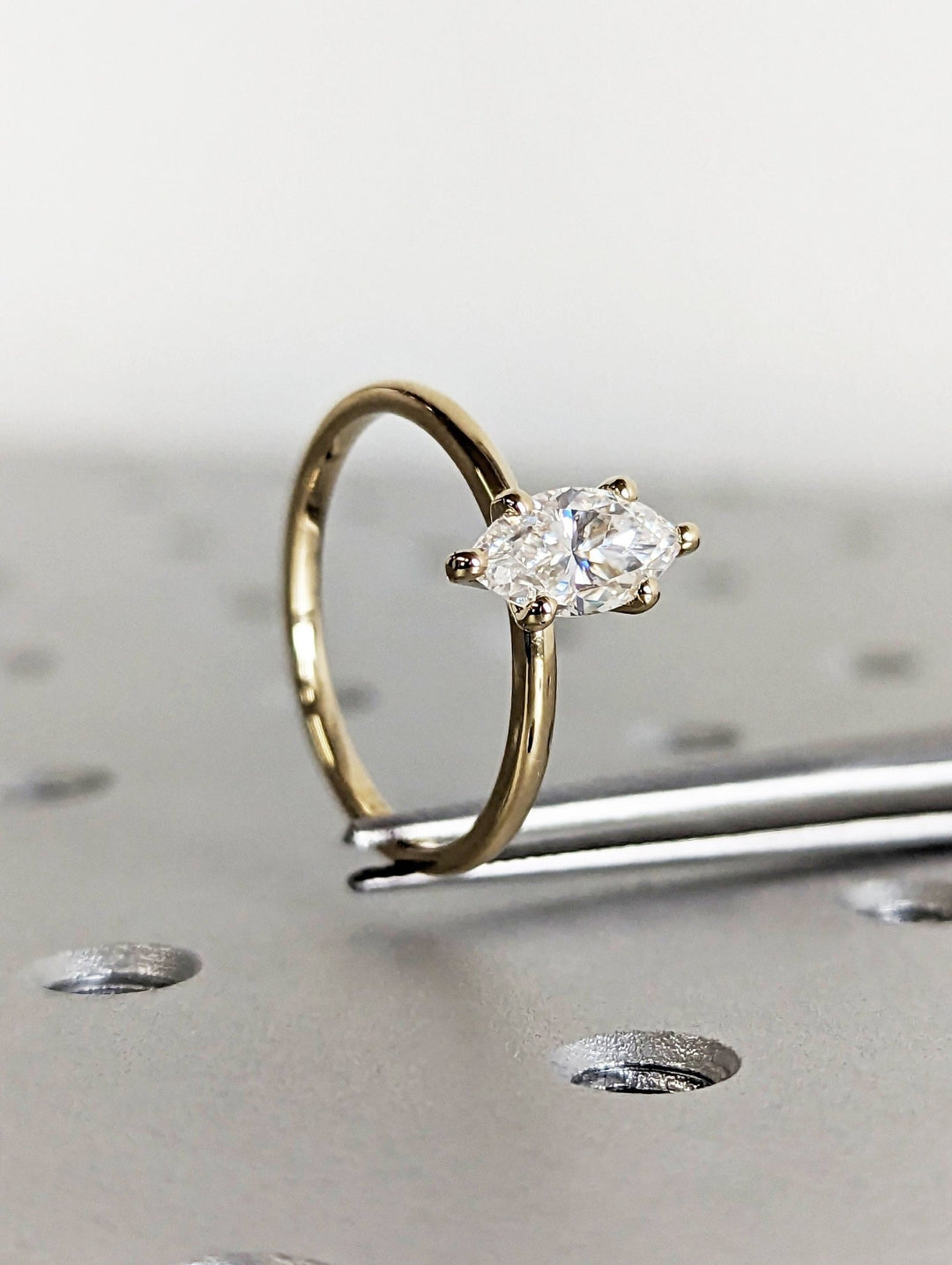 Marquise solitaire lab grown diamond ring fitted on finger