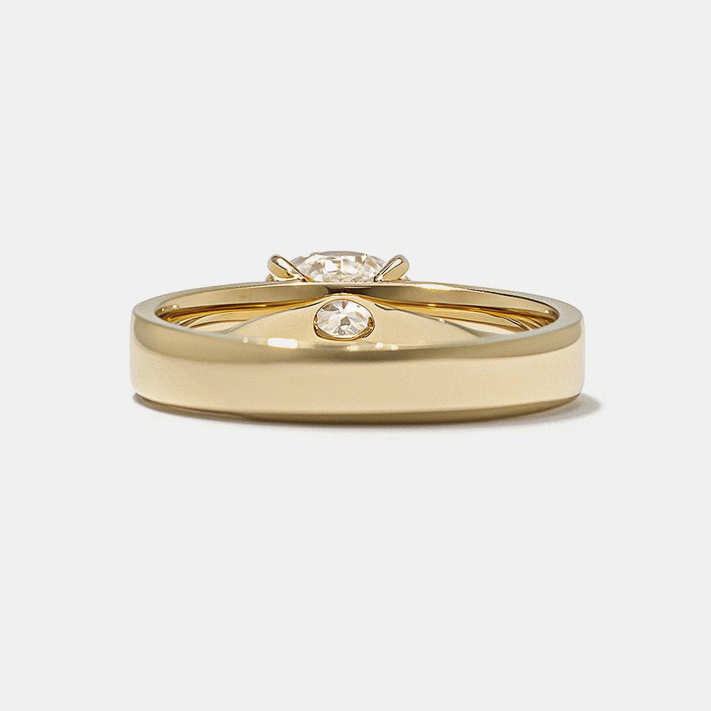 Profile view of oval cut east west engagement ring band