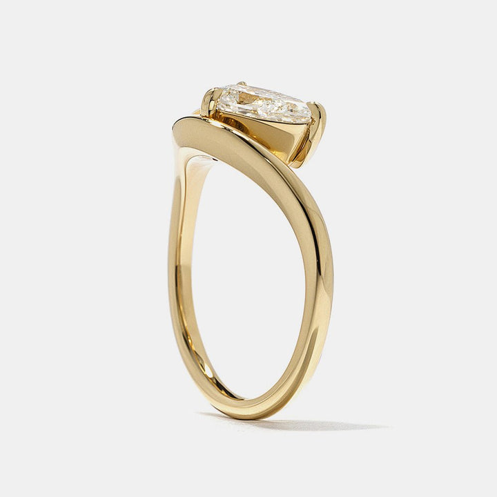 Shop the oval cut bezel engagement ring collection online