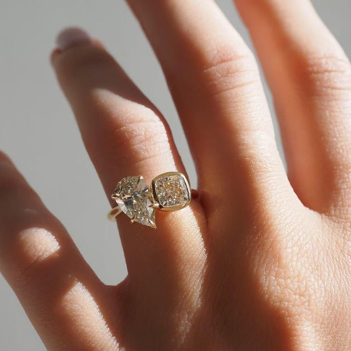Detailed close-up of pear solitaire diamond engagement ring