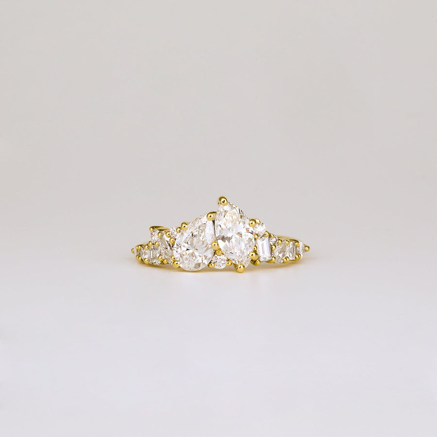 1.0CT pear cut cluster engagement ring available to buy now