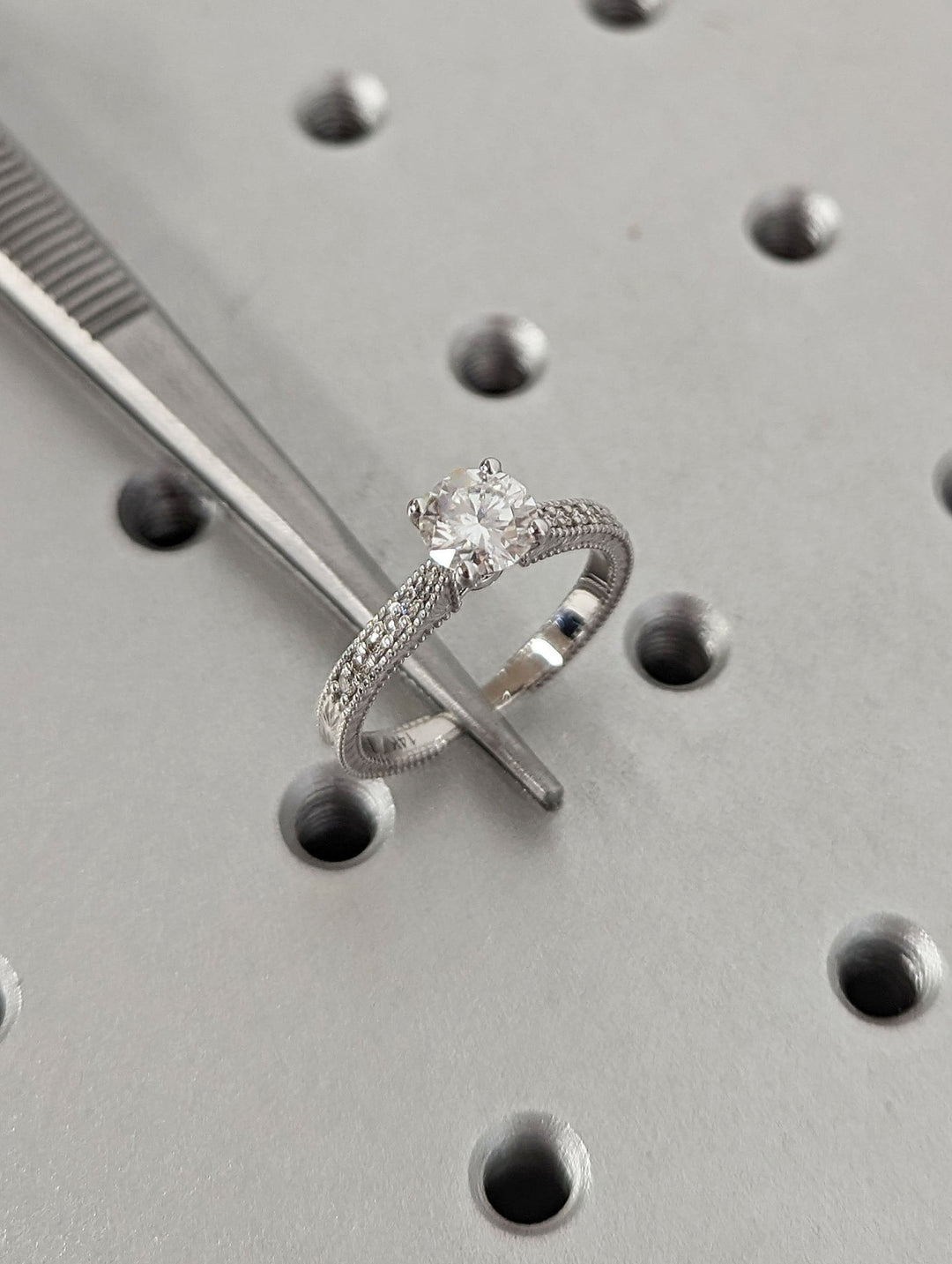 Round vintage engagement ring with IGI certificate and packaging