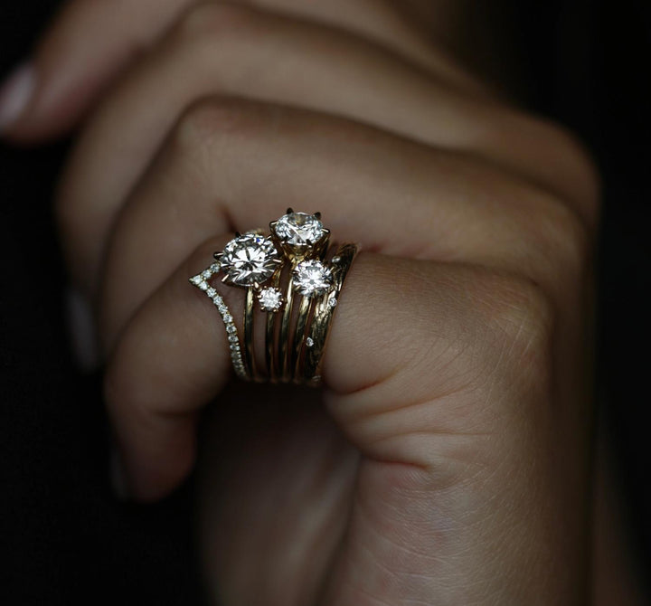 Angled view of round cut diamond in solitaire setting