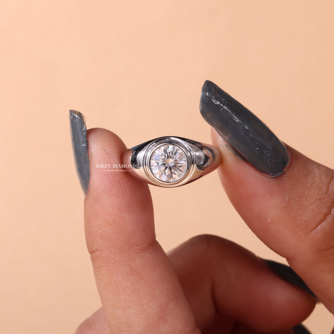 Round dome engagement ring close-up showing E/VS1 diamond clarity