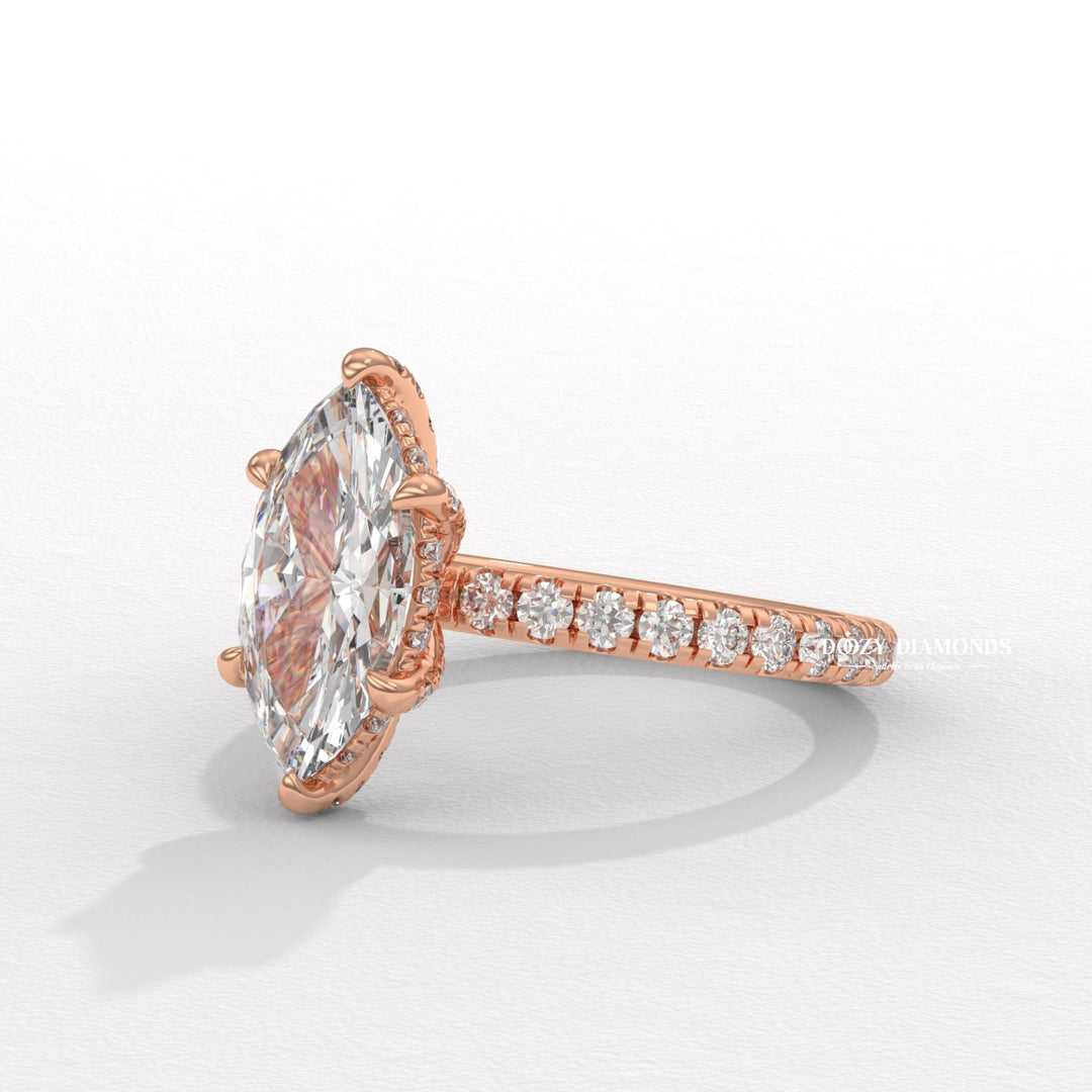 Detailed close-up of marquise solitaire diamond engagement ring