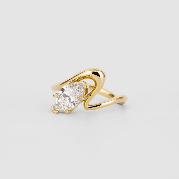 Marquise solitaire engagement ring close-up highlighting diamond sparkle