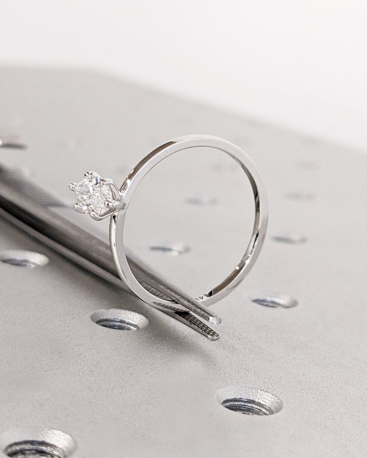 Marquise cut engagement ring side view showing band detail