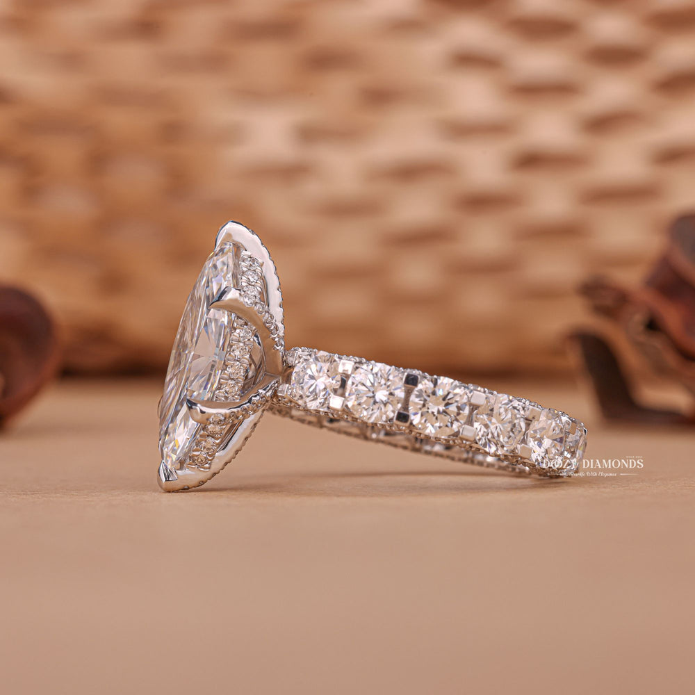 Marquise pave ring set with an IGI graded diamond
