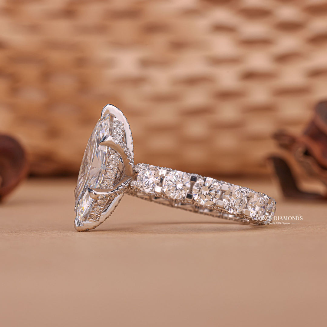 Marquise pave ring set with an IGI graded diamond