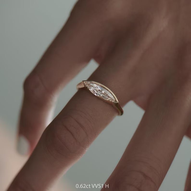 Marquise solitaire engagement ring close-up highlighting diamond sparkle