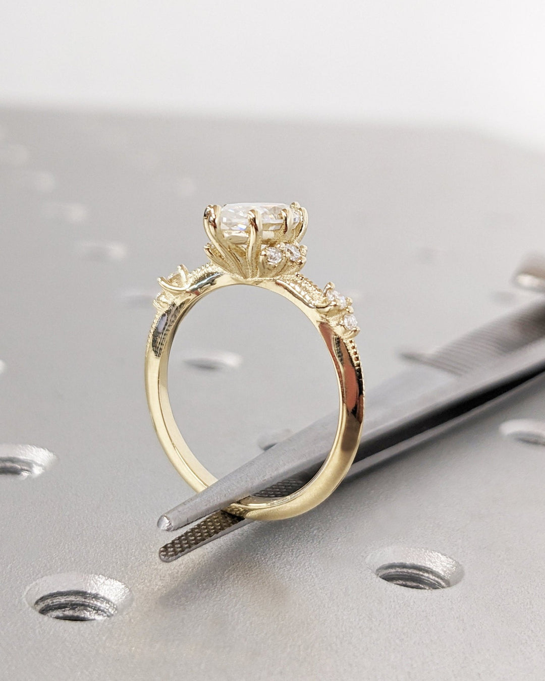 Macro shot of marquise cut diamond facets in cluster ring setting