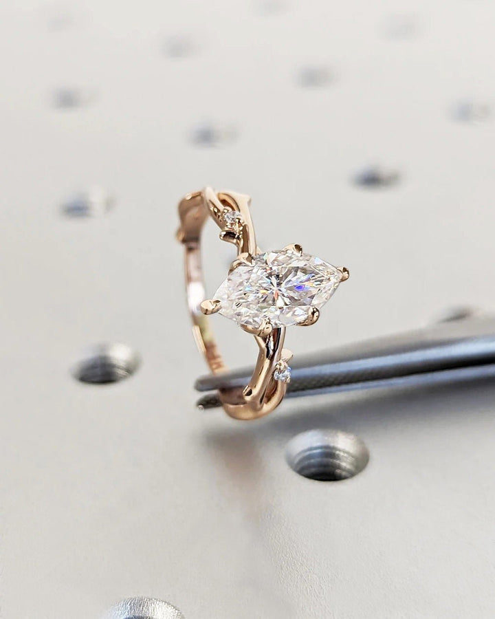 IGI certified marquise cut diamond in solitaire engagement ring setting