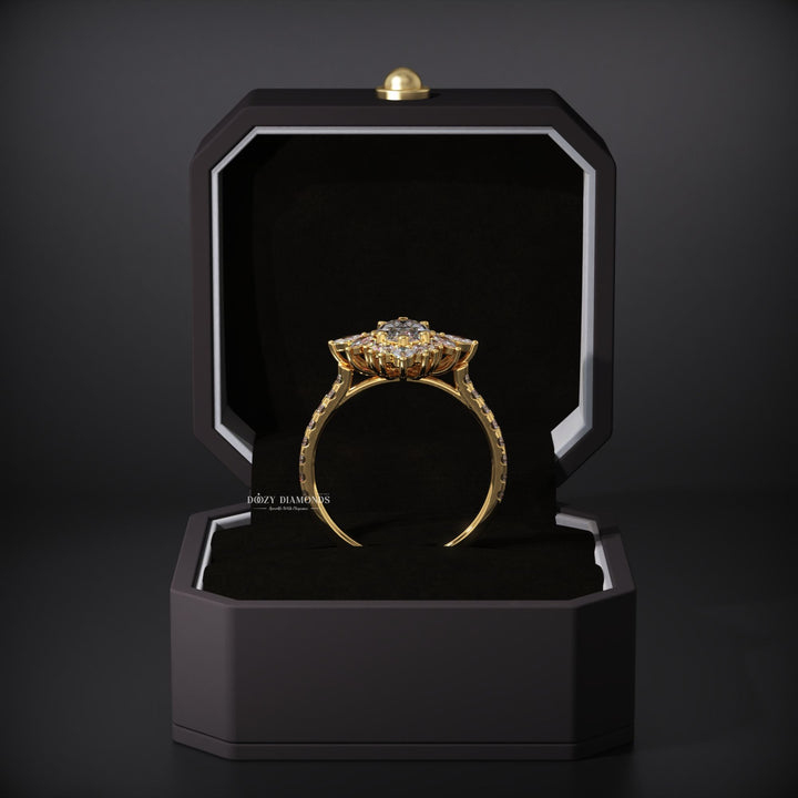 Detailed close-up of marquise cluster diamond engagement ring