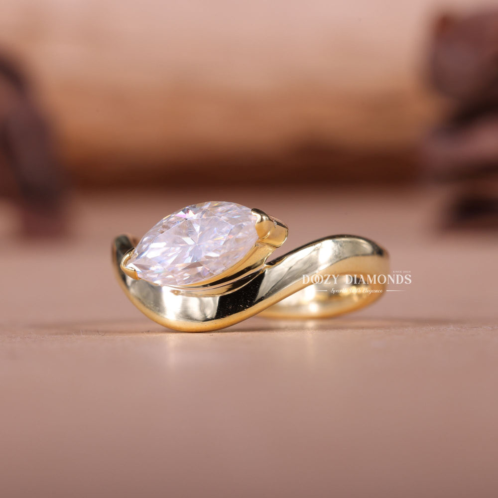 Shop the marquise cut east west engagement ring collection online