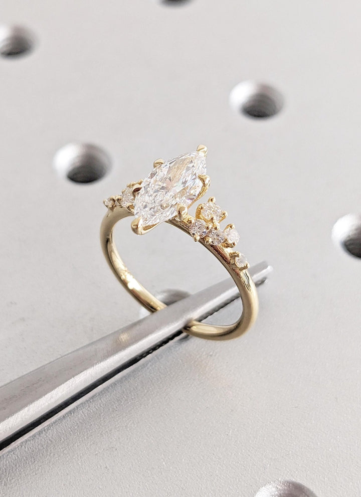 Marquise cut engagement ring side view showing band detail